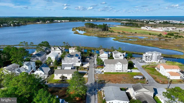 an aerial view of a city with lawn chairs
