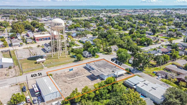 an aerial view of a city with lots of residential buildings