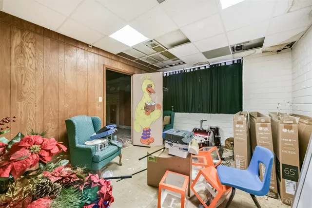 a view of a room with furniture and toys