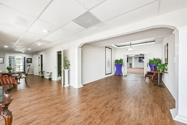 a view of a living room and dining room