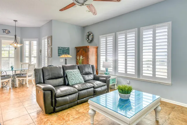 a kitchen with stainless steel appliances granite countertop a sink a stove and cabinets