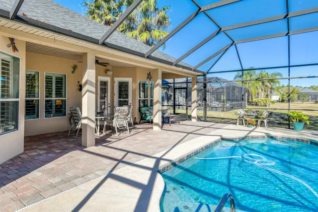 a bathroom with a tub shower and sink