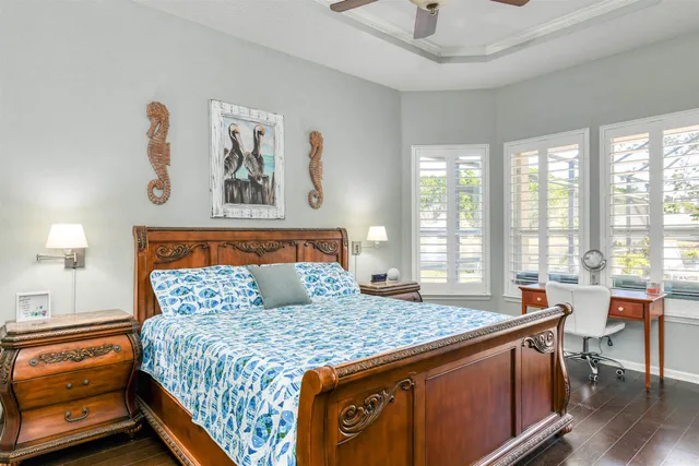 a bathroom with a sink toilet a mirror and shower