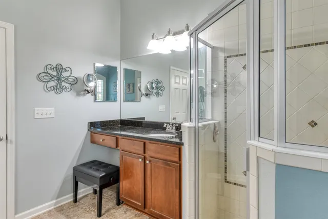 a room with furniture and pool table