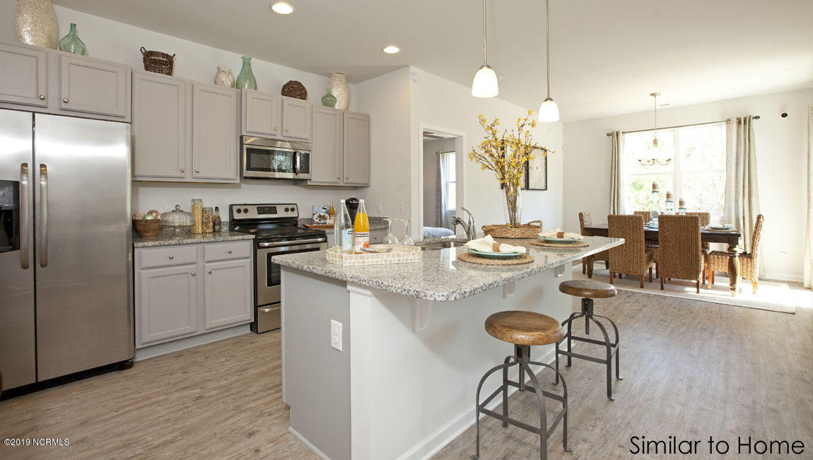699 Morris Landing Road, Unit 152 Holly Ridge, NC 28445 - Photo 8 of 20 KitchenDiningRoom copy