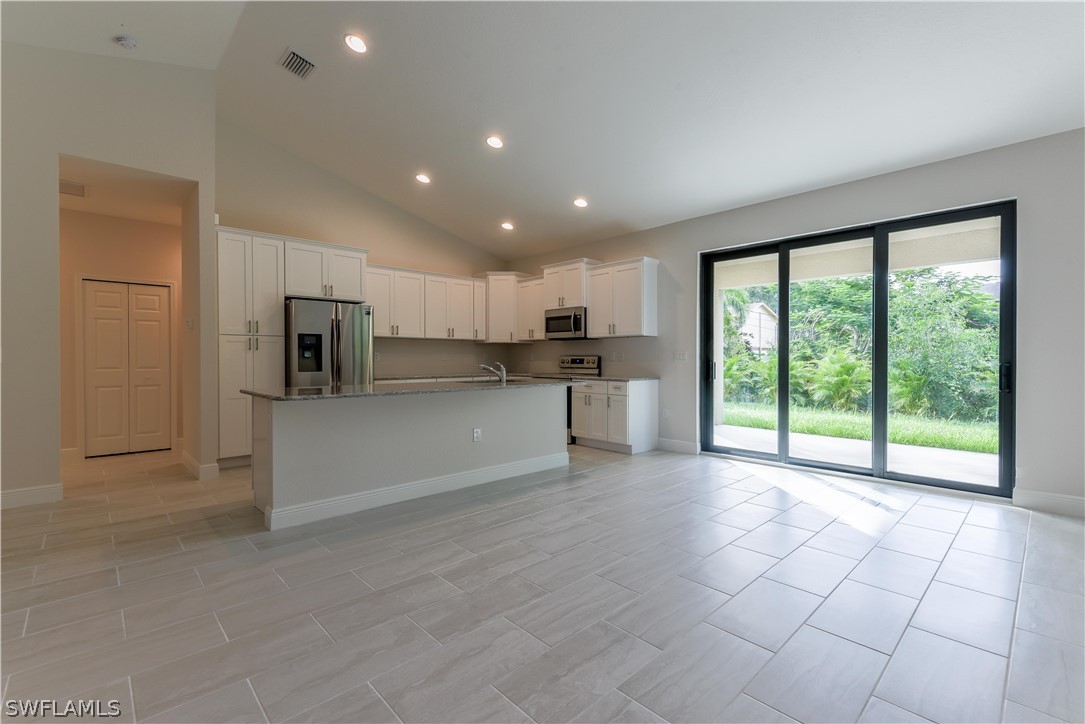 8160 Anhinga Road Fort Myers, FL 33967 - Photo 8 of 25 a view of large kitchen with large windows