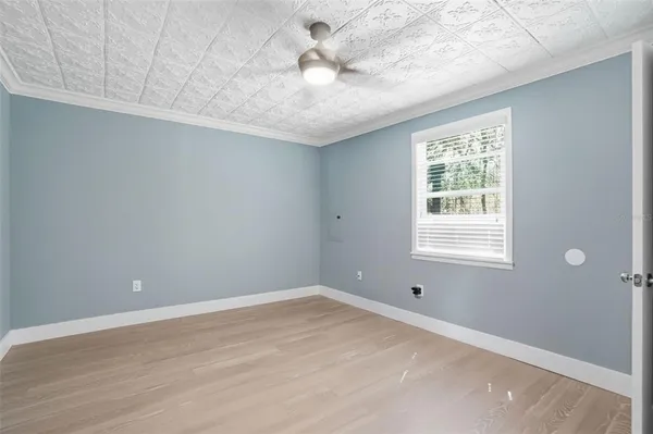 a en suite bathroom with a double vanity sink a mirror and shower