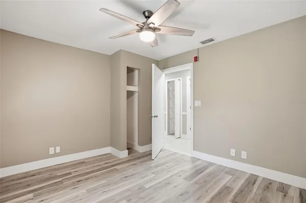 a view of a storage & utility room with a washer dryer