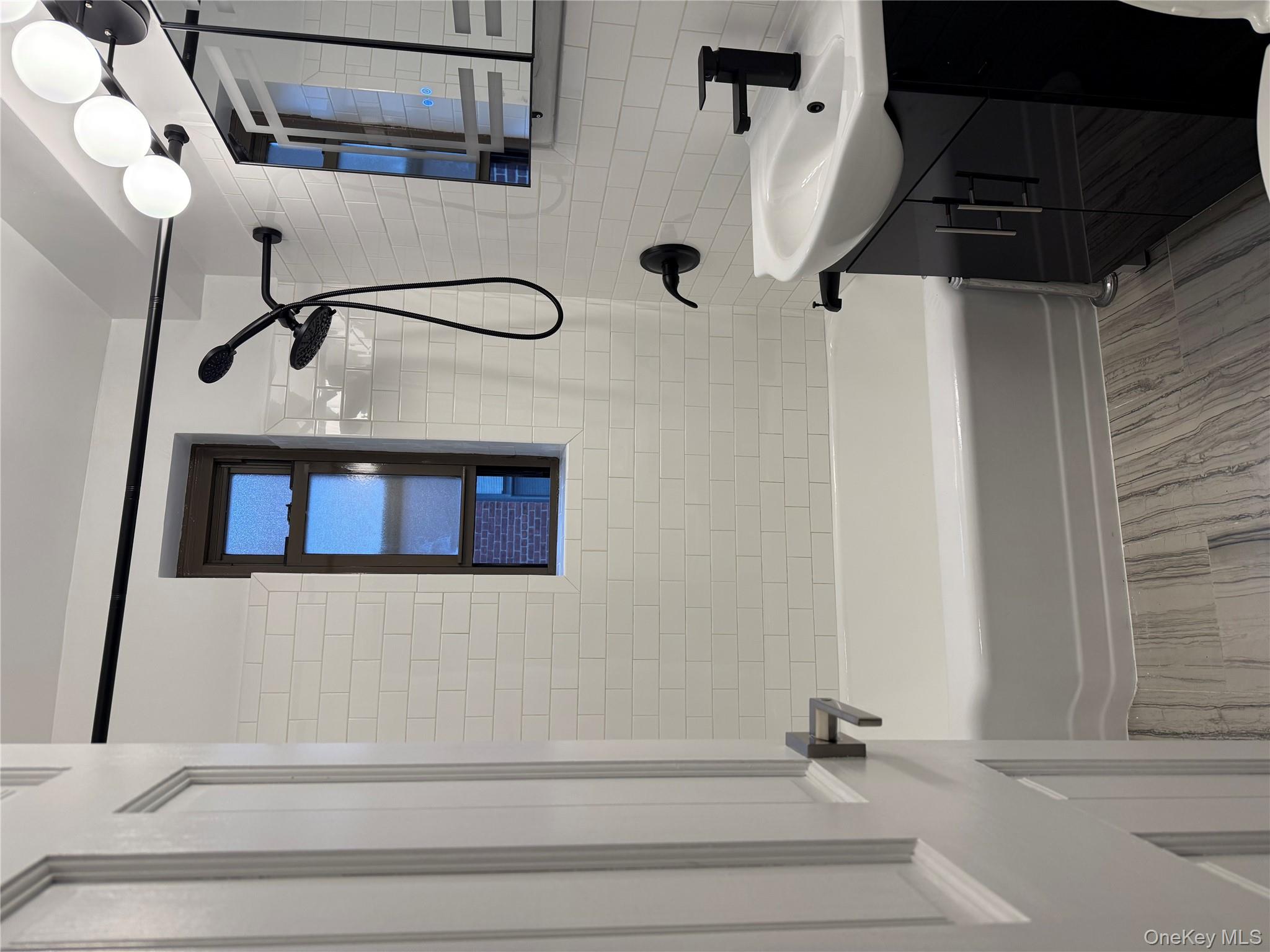 a bathroom with a sink and a bathtub