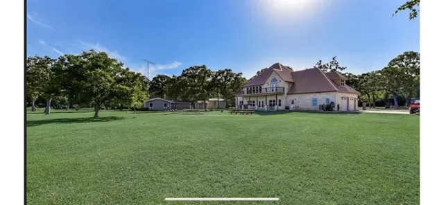 a house view with garden space