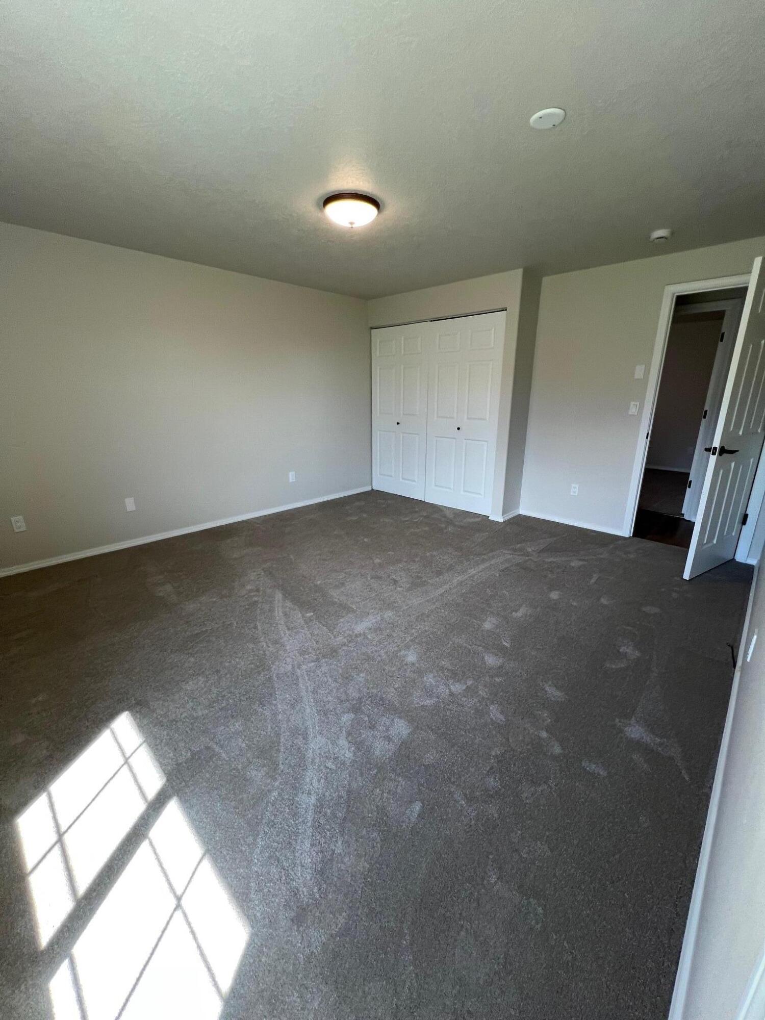 629 Deer Ridge Court Madras, OR 97741 - Photo 23 of 39 an empty room with windows