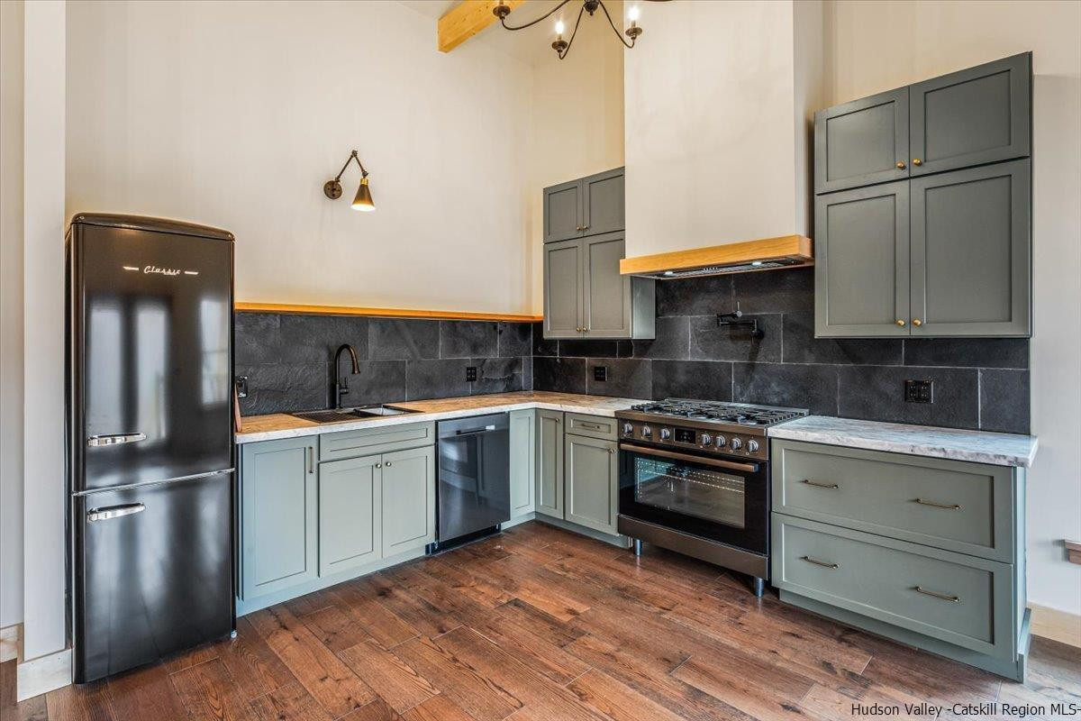 41 Carr George Road Roxbury, NY 12421 - Photo 10 of 26 a kitchen with stainless steel appliances granite countertop a refrigerator a stove and a sink