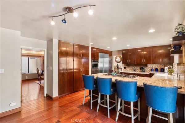 a view of a porch with wooden floor and outer view