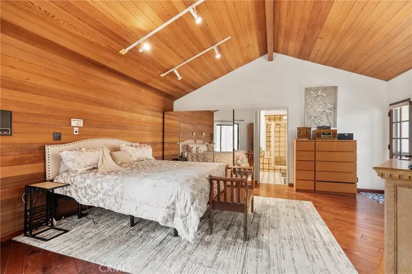 a view of a kitchen with a sink and furniture