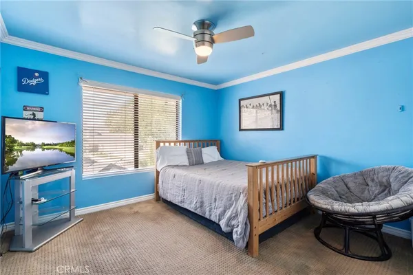 a view of a patio with table and chairs with wooden floor and fence