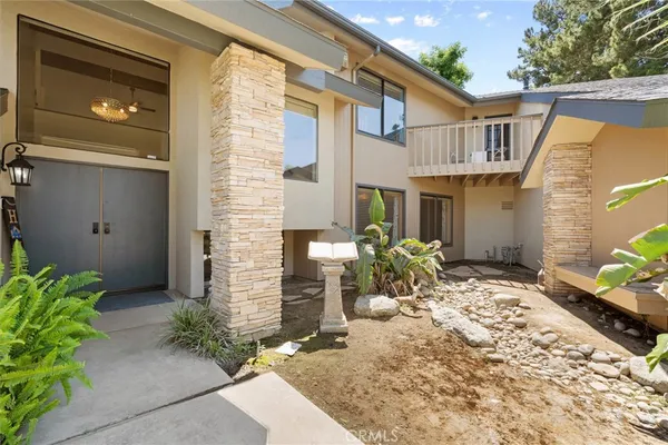 a very nice looking living room with dining room