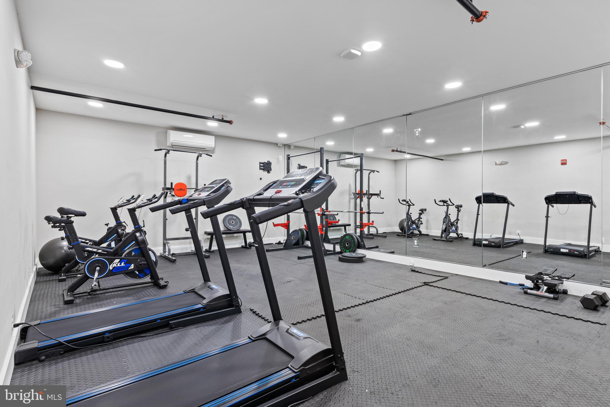 1028 Bladensburg Road Northeast, Unit 37 Washington, DC 20002 - Photo 28 of 29 a view of a room with gym equipment
