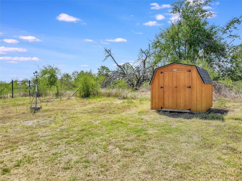 1000 County Road 484 Elgin, TX 78621 - Photo 22 of 30 a view of a back yard