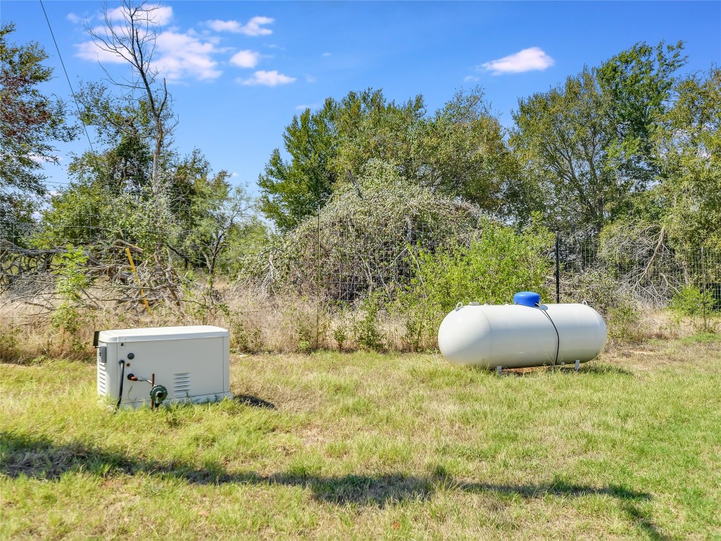 1000 County Road 484 Elgin, TX 78621 - Photo 24 of 30 a view of a back yard