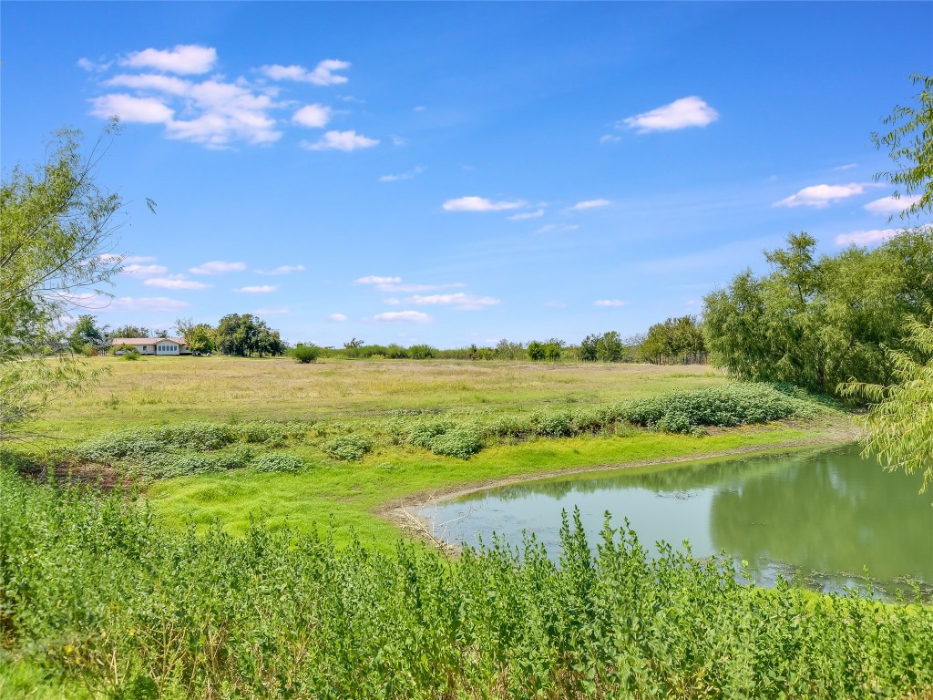 1000 County Road 484 Elgin, TX 78621 - Photo 6 of 30 a view of a lake with a city