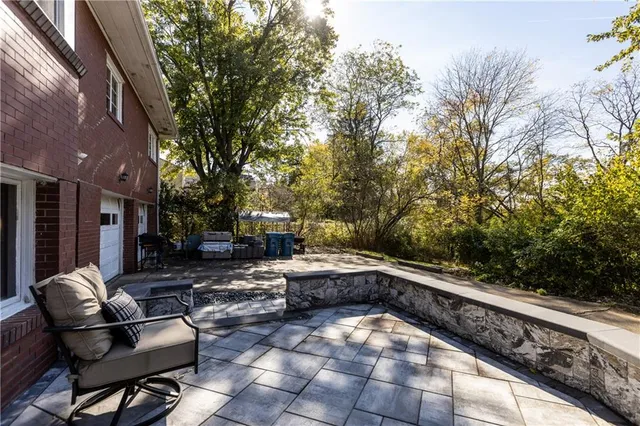 a backyard of a house with seating space