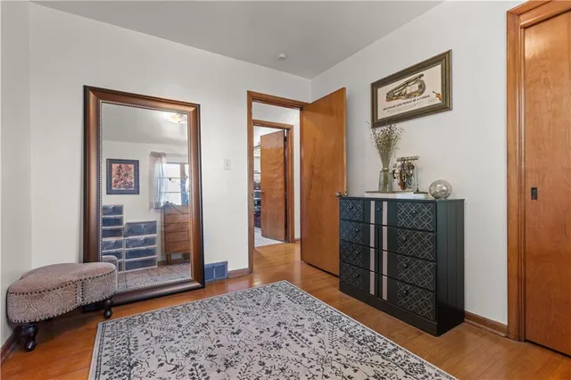 a bedroom with a bed and furniture