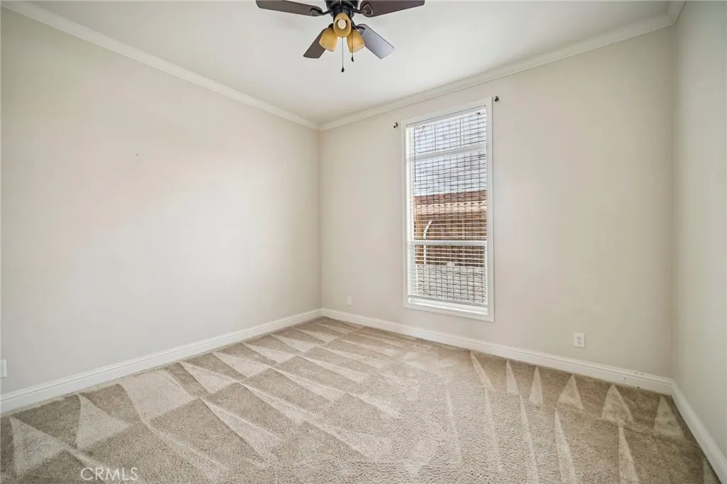 250 East Telegraph Road, Unit 307 Fillmore, CA 93015 - Photo 18 of 36 a view of an empty room with a window