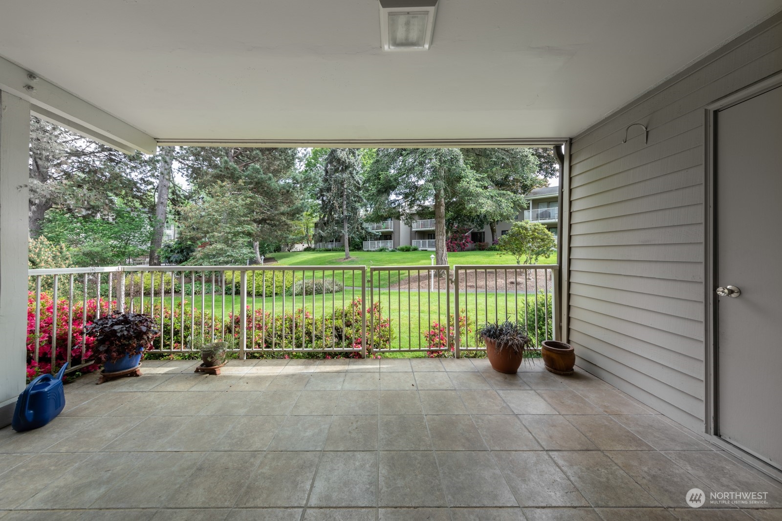 6467 Sand Point Way Northeast Seattle, WA 98115 - Photo 20 of 29 a view of a garden with an outdoor seating