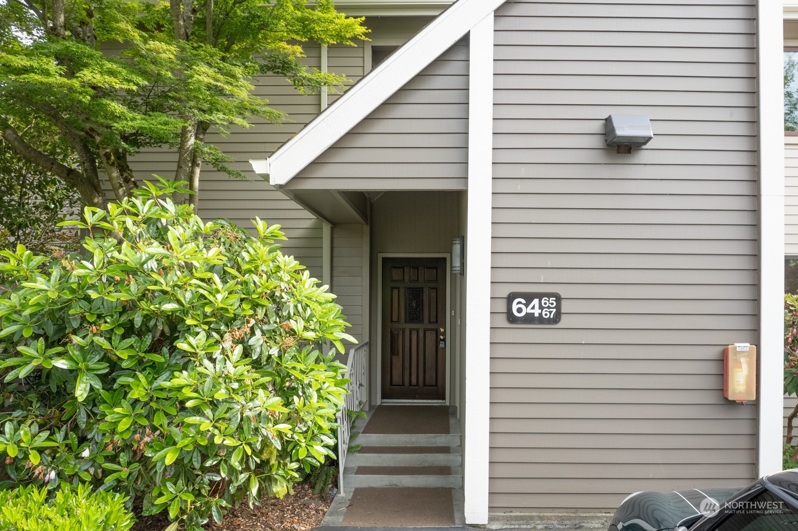 6467 Sand Point Way Northeast Seattle, WA 98115 - Photo 2 of 29 a view of a small garden