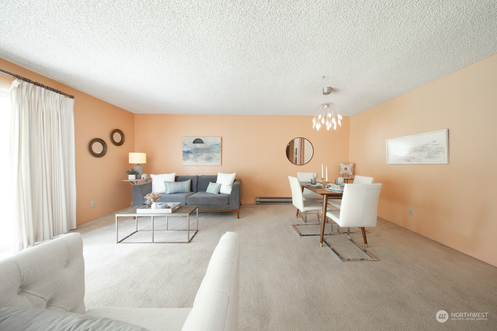 6467 Sand Point Way Northeast Seattle, WA 98115 - Photo 4 of 29 a living room with furniture and a large window