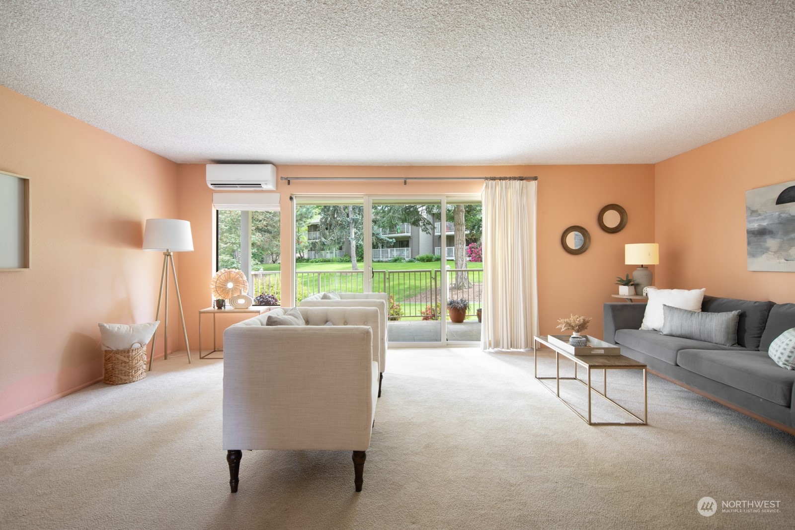 6467 Sand Point Way Northeast Seattle, WA 98115 - Photo 8 of 29 a living room with furniture and a large window