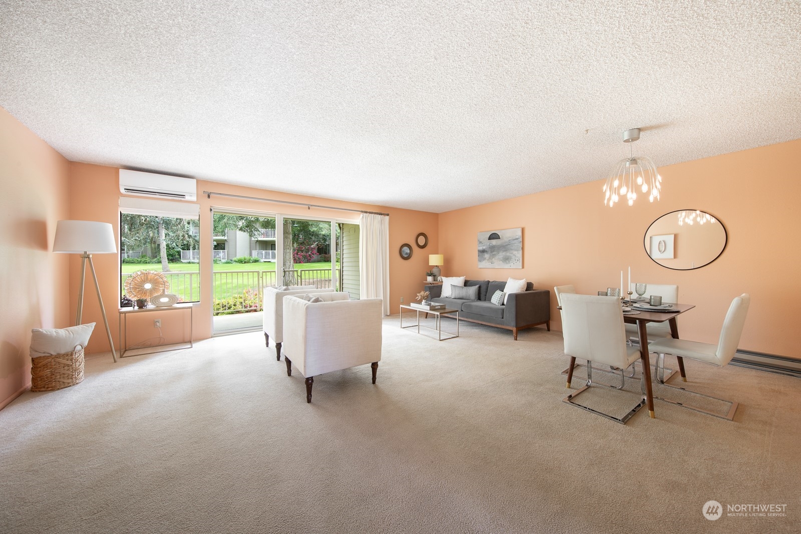6467 Sand Point Way Northeast Seattle, WA 98115 - Photo 9 of 29 a living room with furniture and a large window