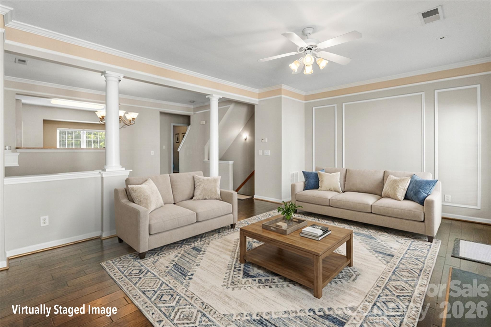 104 Rock Ridge Lane Mount Holly, NC 28120 - Photo 14 of 48 a living room with furniture and a chandelier