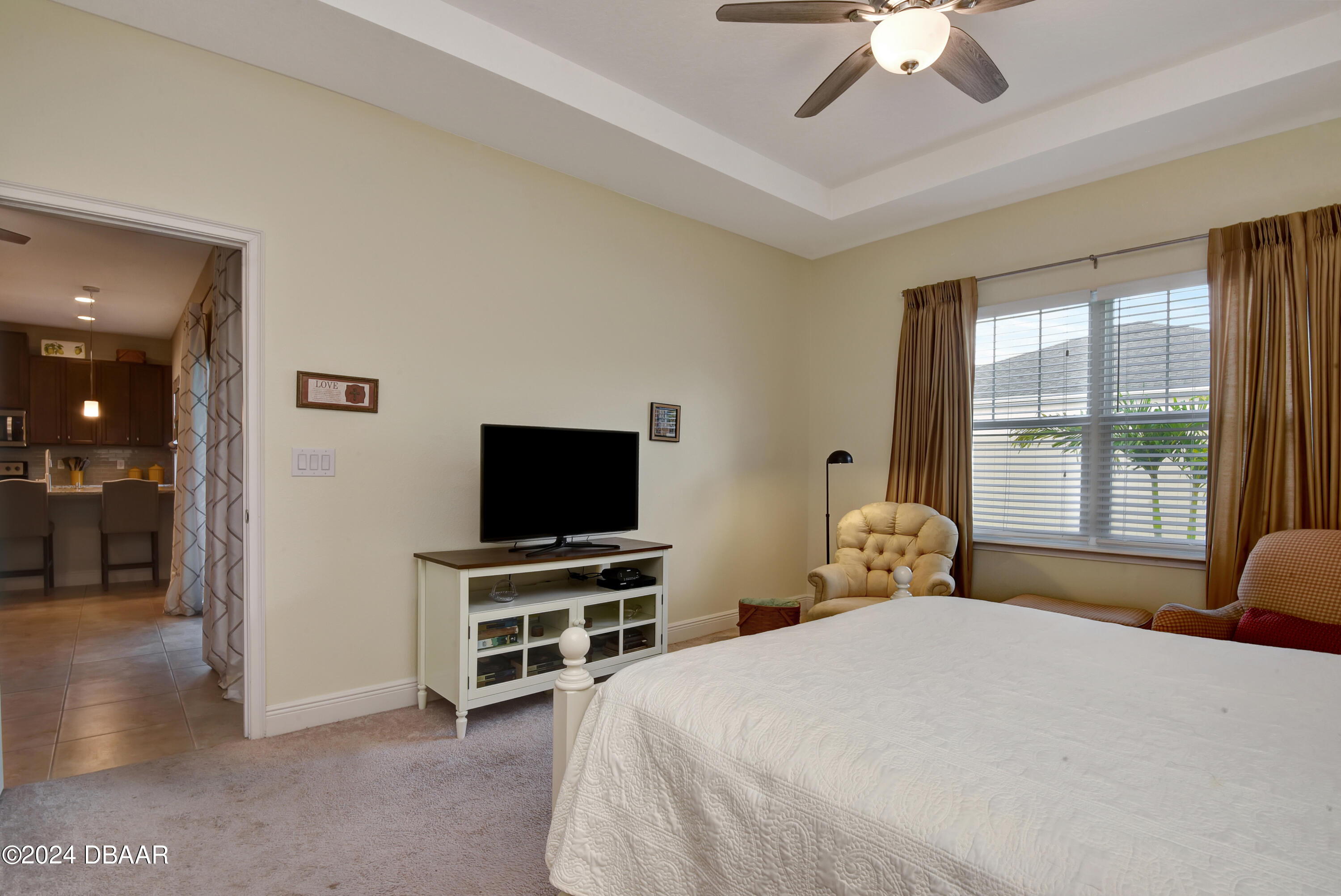 5430 Estero Loop Port Orange, FL 32128 - Photo 19 of 66 a bedroom with a bed and a flat screen tv