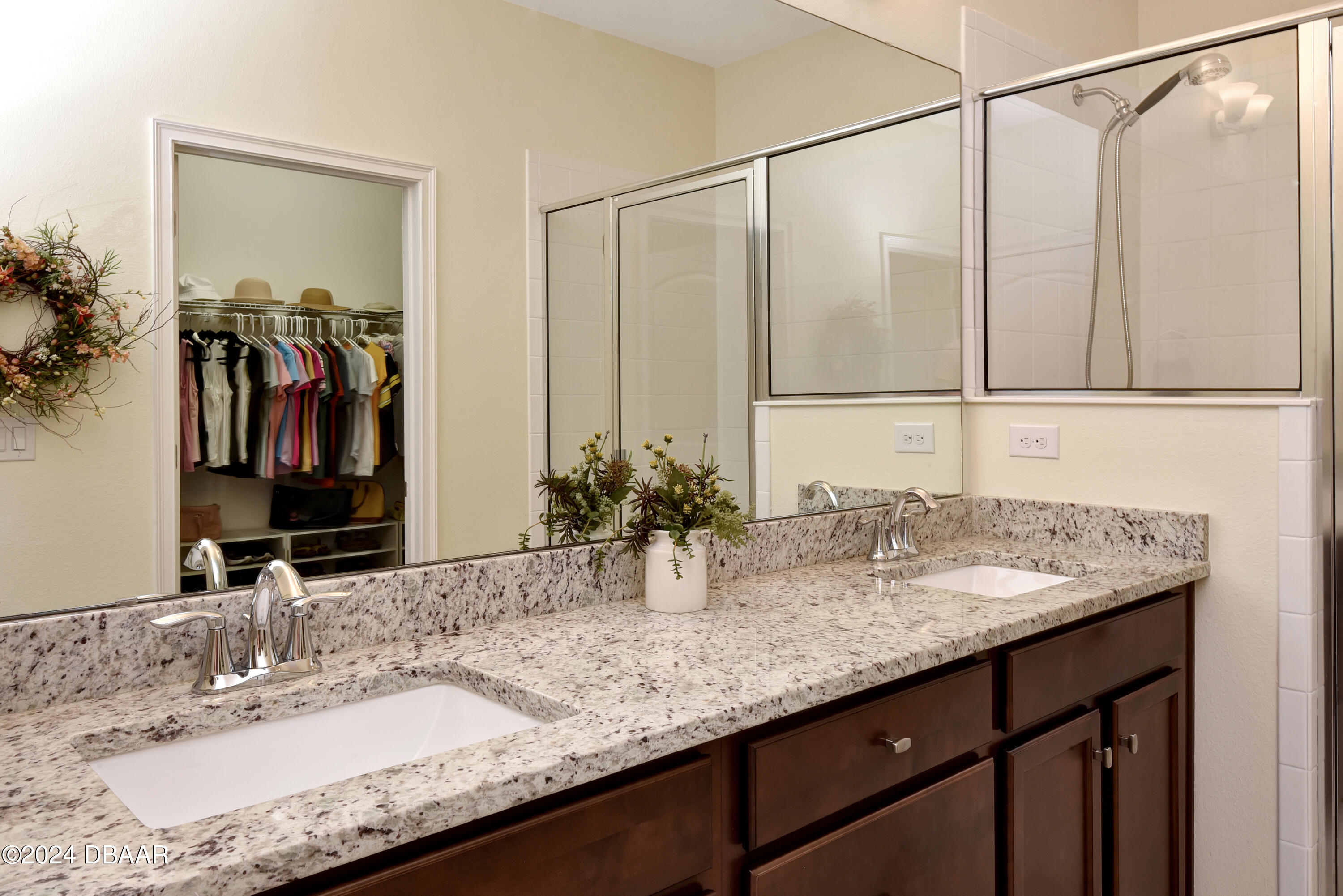 5430 Estero Loop Port Orange, FL 32128 - Photo 21 of 66 a bathroom with a granite countertop sink and a mirror