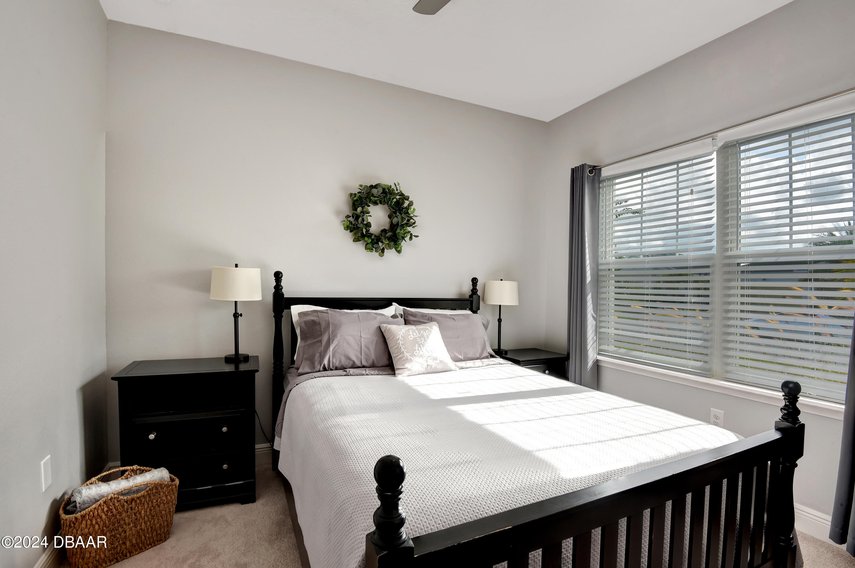 5430 Estero Loop Port Orange, FL 32128 - Photo 26 of 66 a bedroom with a bed and a window