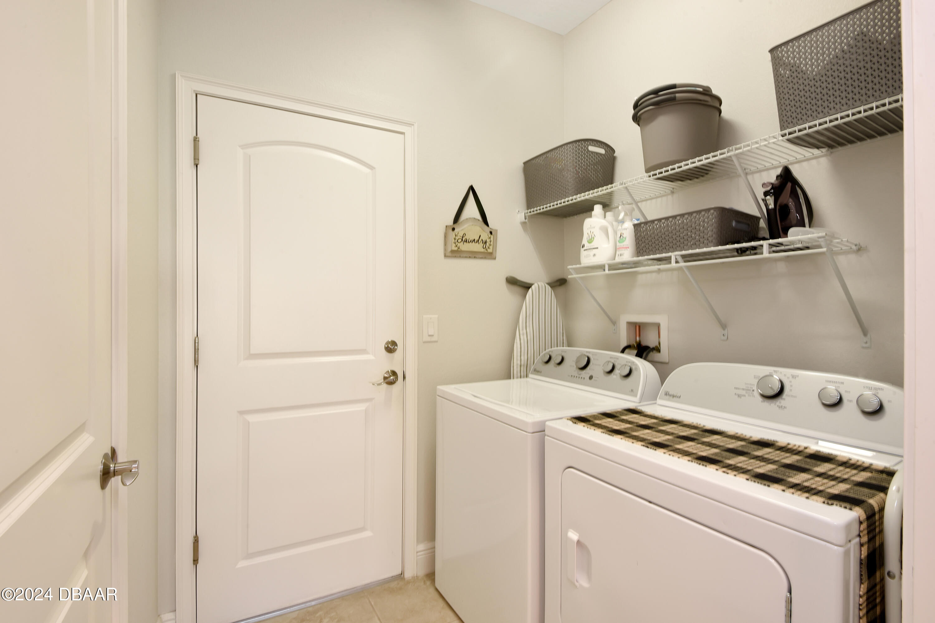 5430 Estero Loop Port Orange, FL 32128 - Photo 35 of 66 a utility room with dryer and washer