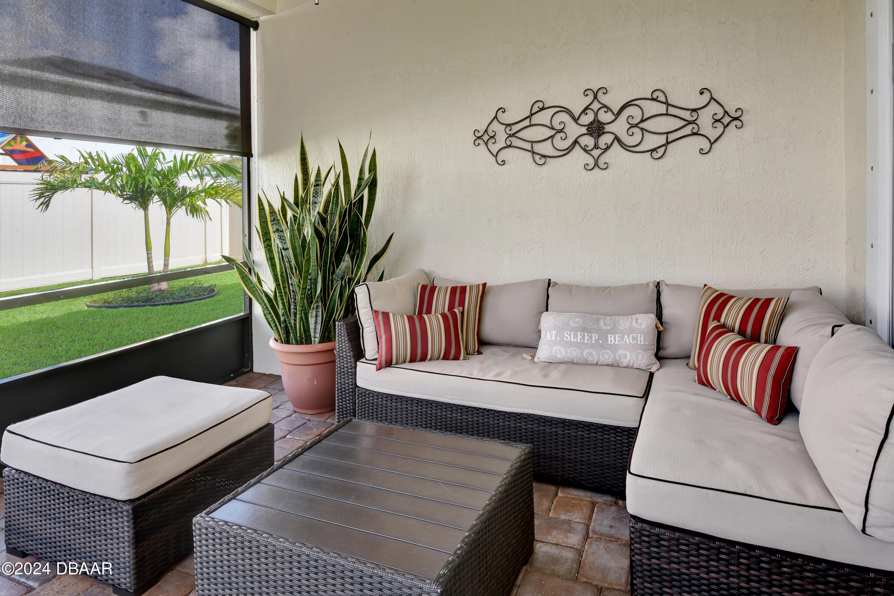 5430 Estero Loop Port Orange, FL 32128 - Photo 38 of 66 a living room with furniture and a potted plant