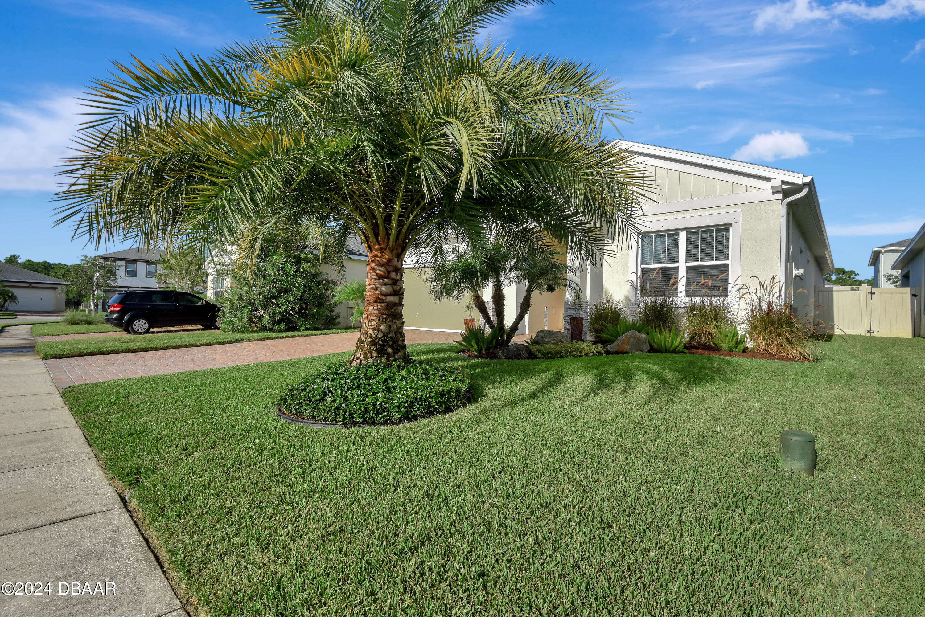 5430 Estero Loop Port Orange, FL 32128 - Photo 52 of 66 a view of a house with a yard