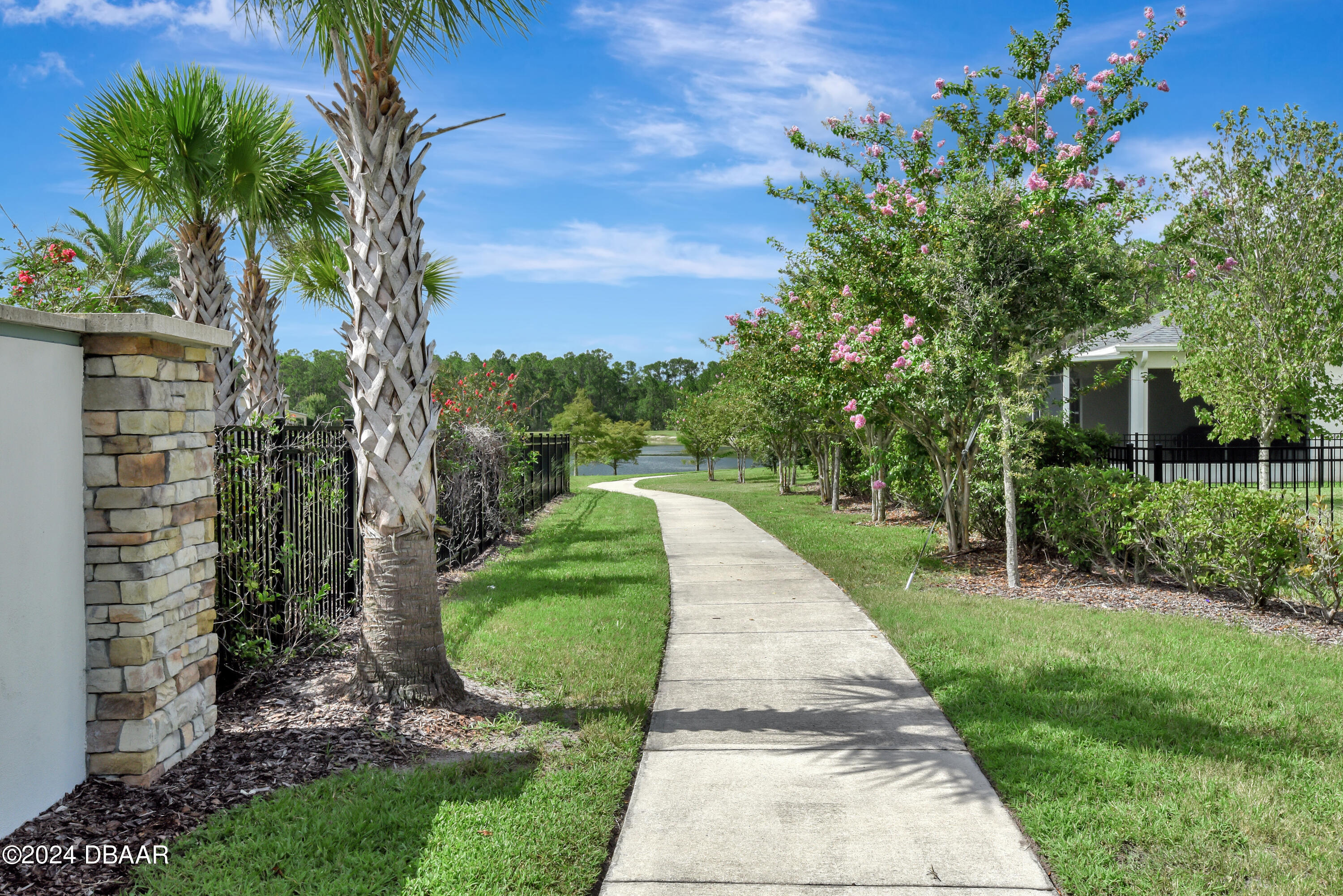 5430 Estero Loop Port Orange, FL 32128 - Photo 64 of 66 a view of a garden with a fountain