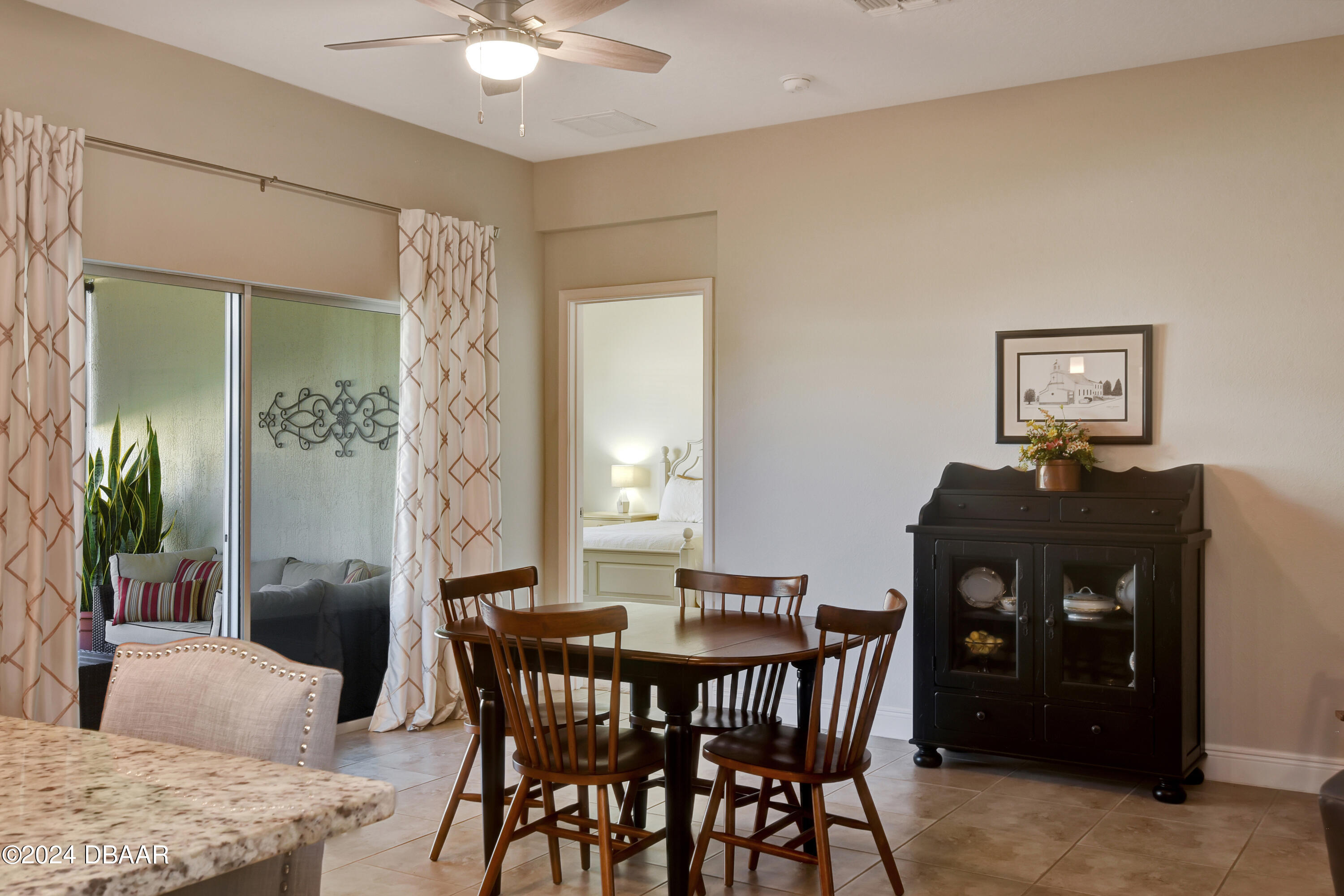 5430 Estero Loop Port Orange, FL 32128 - Photo 8 of 66 a dining room with furniture and window