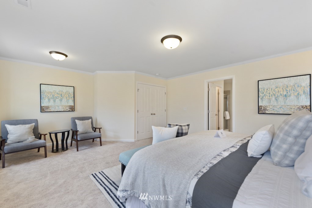 16232 Southeast 139th Court Renton, WA 98059 - Photo 11 of 23 a bedroom with furniture and a large mirror
