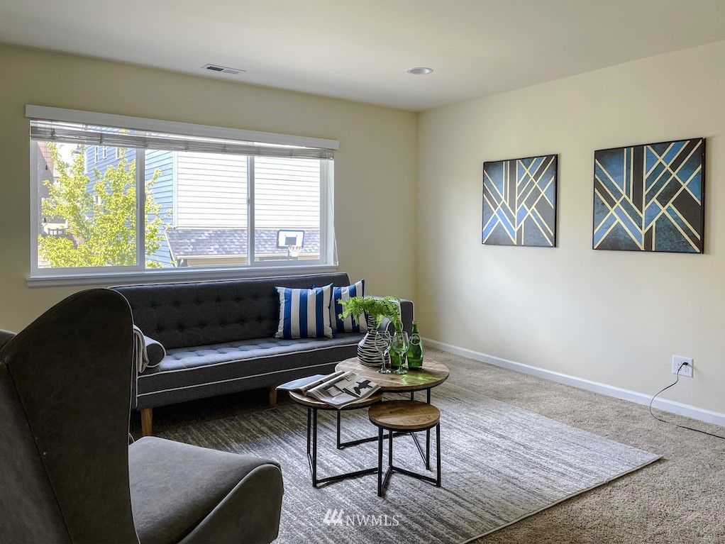 16232 Southeast 139th Court Renton, WA 98059 - Photo 15 of 23 a living room with furniture and a window