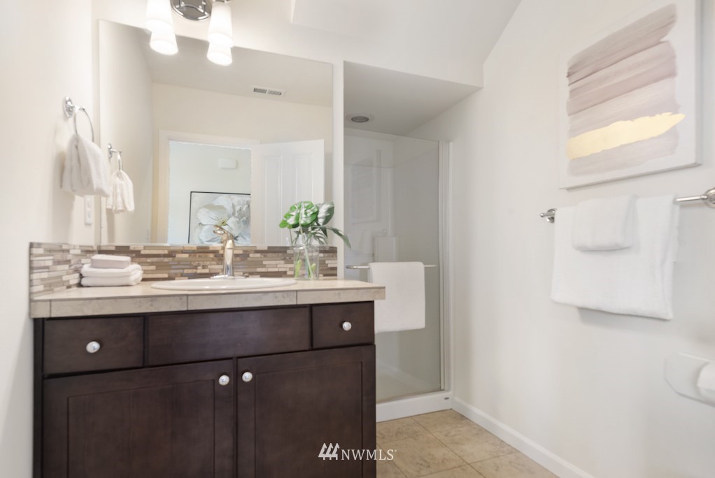 16232 Southeast 139th Court Renton, WA 98059 - Photo 18 of 23 a bathroom with a sink and a mirror