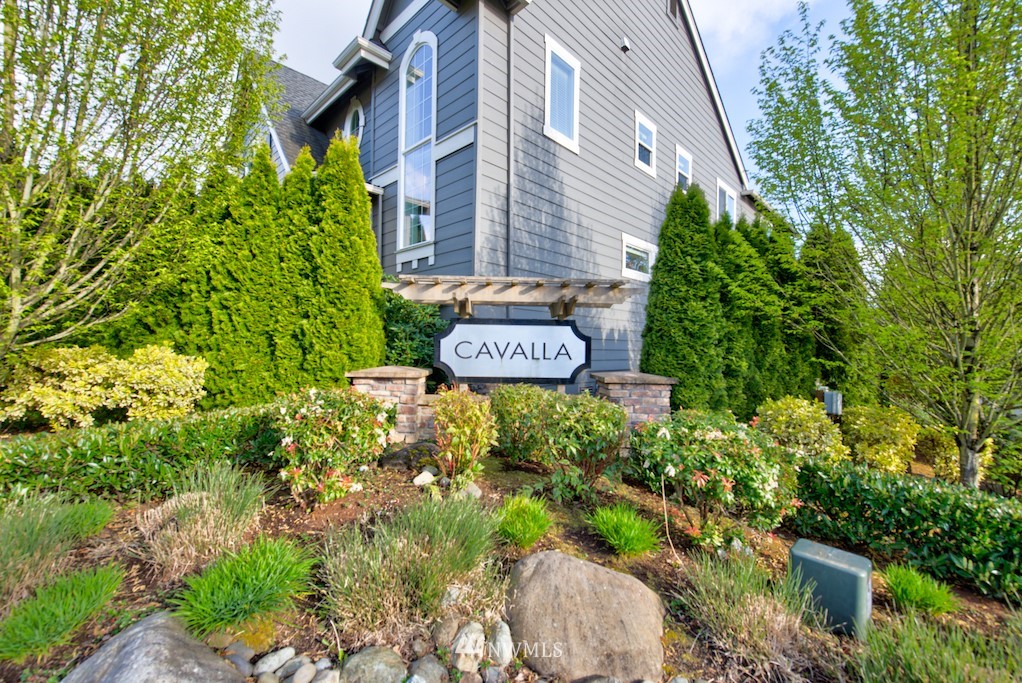16232 Southeast 139th Court Renton, WA 98059 - Photo 22 of 23 a sign board with a building in the background