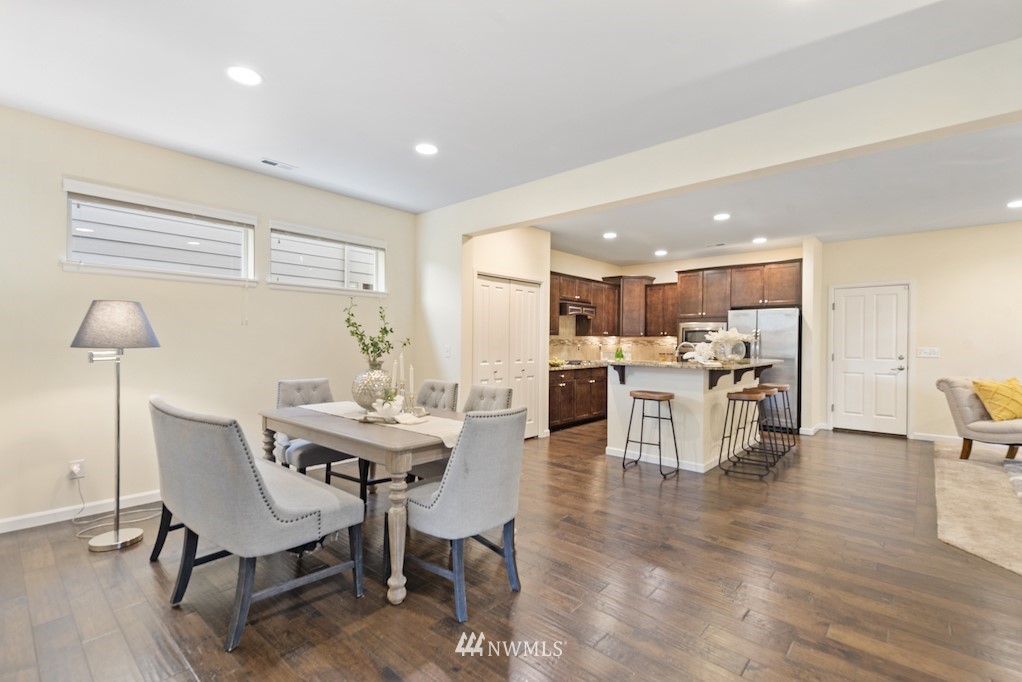 16232 Southeast 139th Court Renton, WA 98059 - Photo 5 of 23 a living room with furniture and kitchen view