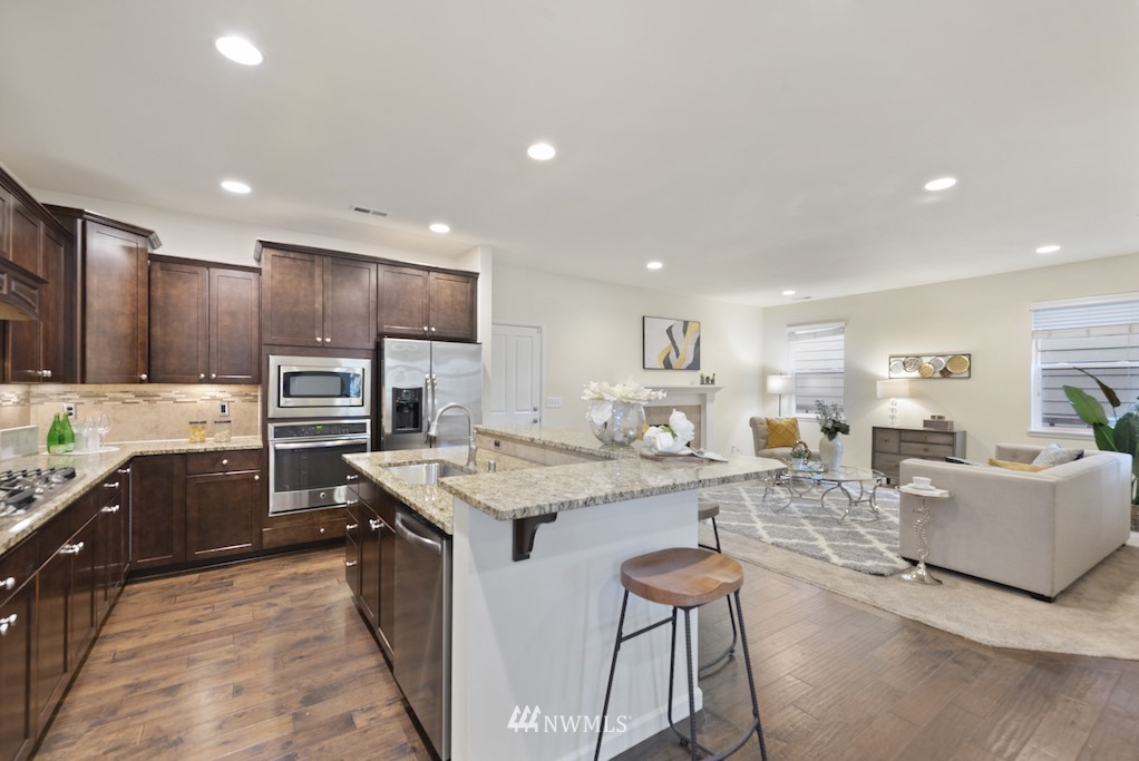 16232 Southeast 139th Court Renton, WA 98059 - Photo 6 of 23 a large kitchen with stainless steel appliances lots of counter top space