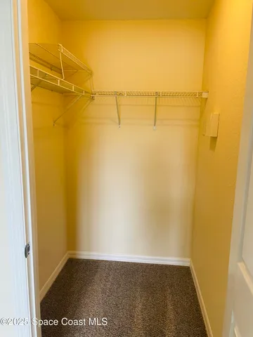 a view of a walk in closet