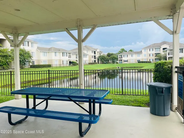 a view of a chairs and table in the deck