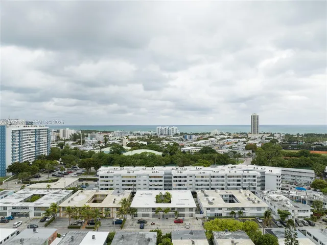 an aerial view of a city with lots of residential buildings